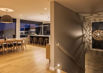 Timber flooring in the Millwater home helps add warmth to the interior design